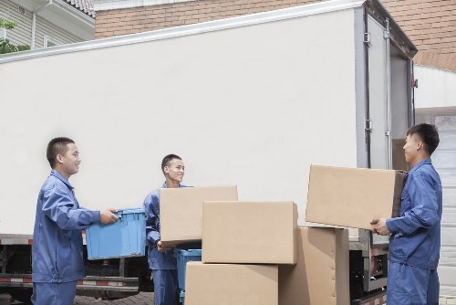 Removal team planning a move in a Docklands apartment building