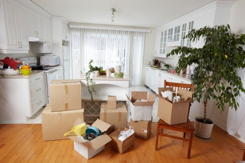 Moving checklist and boxed household items ready for Docklands removals