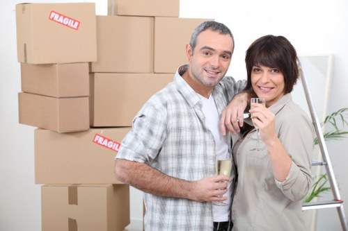 Modern workplace furniture and IT equipment being relocated